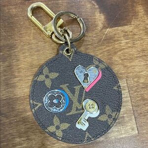 Louis Vuitton love lock keychain bag charm